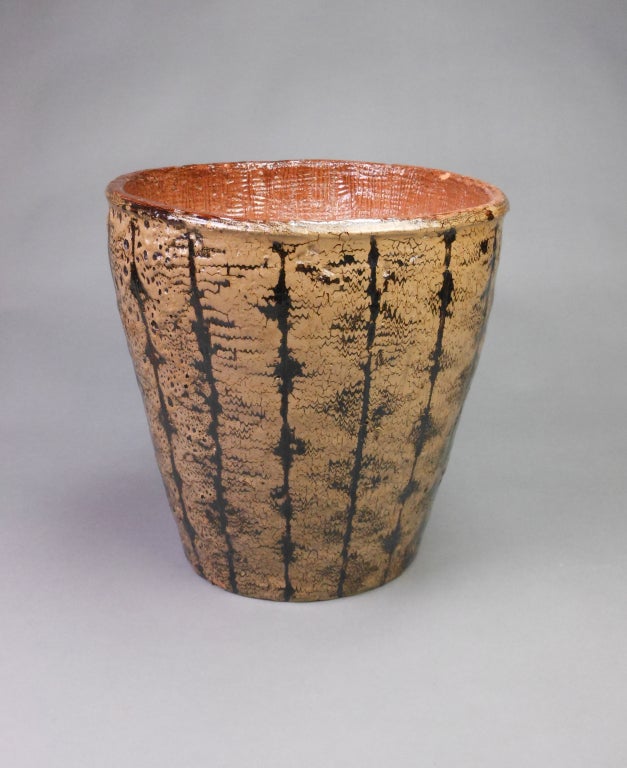 This large-scale tapering vessel is decorated with an abstract mottled brown and black linear glaze. Signed on the underside Cartier '56. 

Jean Cartier (1924-1996), one of the most important Canadian ceramists, studied in Paris and Montreal in