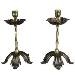 A Pair of English Art Nouveau Brass and Copper Candlesticks