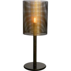 A Brass Lamp with a Perforated Shade