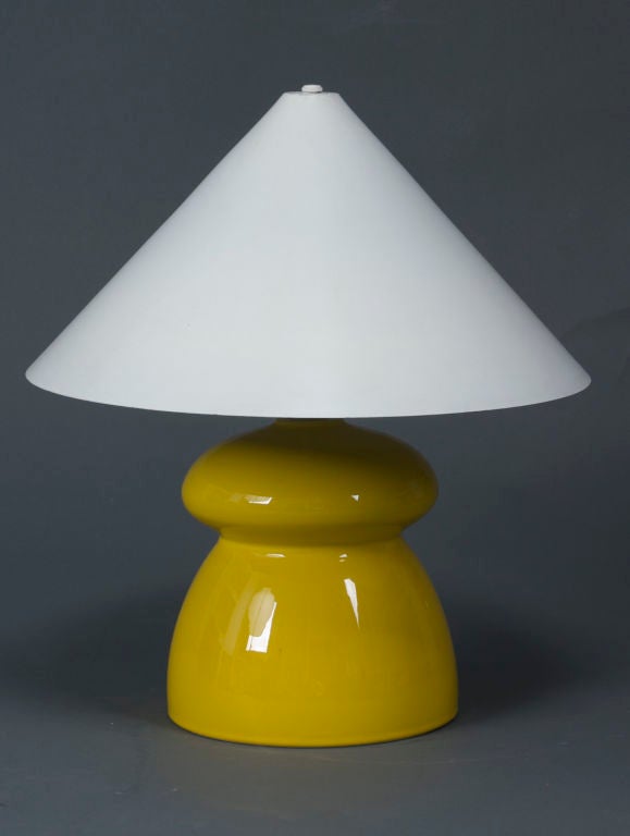 These cheerful, bright yellow lamps have a rounded, 