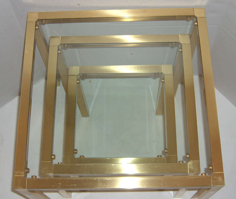 Modern A Set of French Metal Nesting Tables with a Brilliant Gold Finish