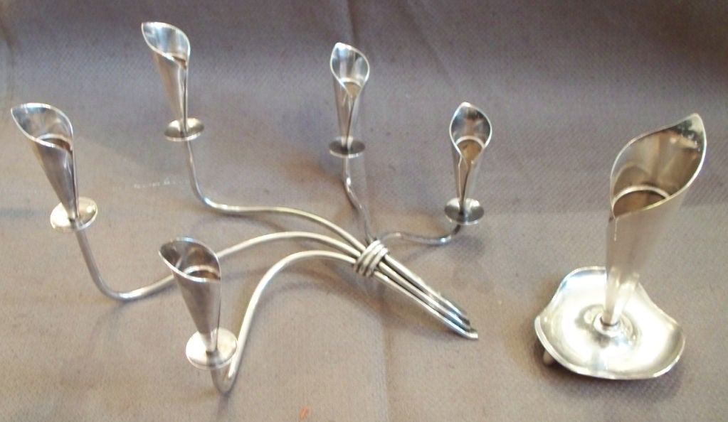 a single silver plated Hans Jensen Calla Lily Candlestick and an accompanying 5 light silver plated Cally Lily Candelabra.  Priced as a group but can be sold separately.