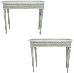A Pair of Carved Wood Louis XVI Style Marble Topped Consoles