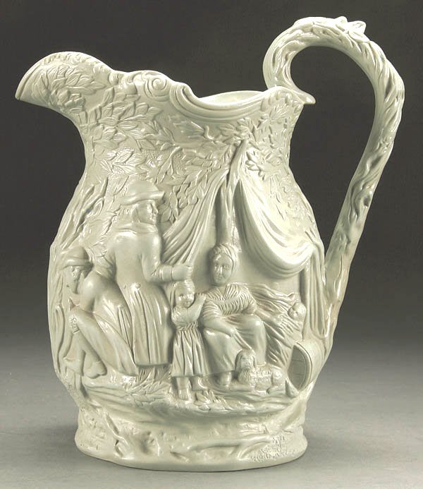 Designed and produced by the Jones & Walley Co. of Cobridge, Stoke-on-Trent, England. This molded earthenware jug depicts a gypsy camping scene in high relief. From the private collection of knitwear designer Joan Vass.