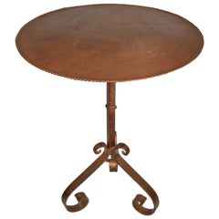 Handcrafted Table with Patinated Metal Top and Antique Iron Candle Stand Base