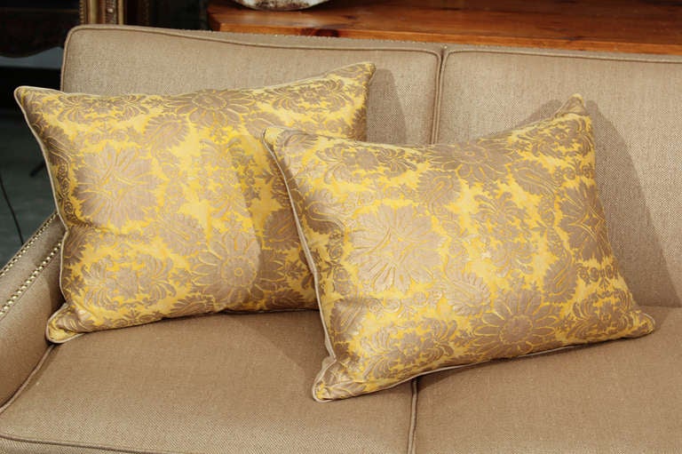 Beautiful lemon yellow Fortuny pillows backed in linen, filled with down. Sold individually, pair is available.