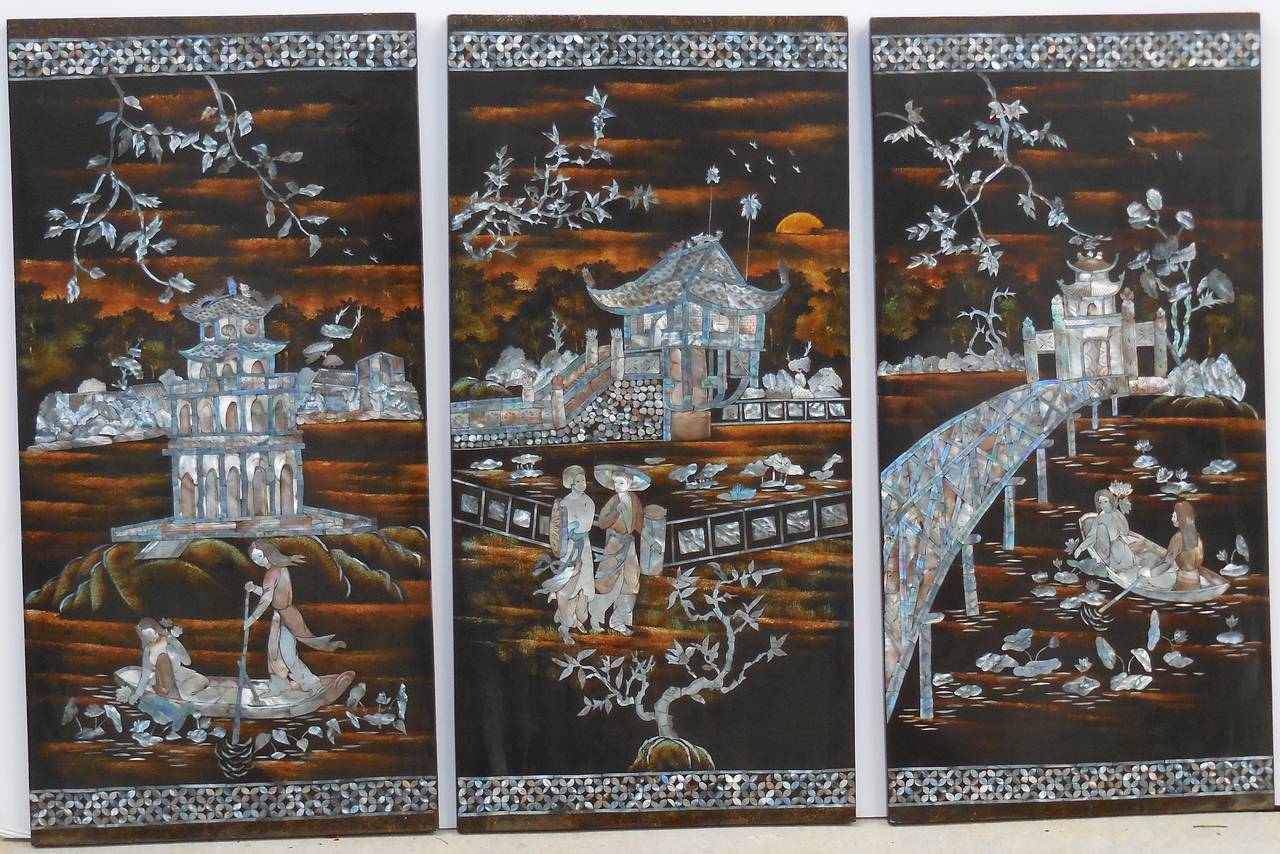 Beautiful set of three Chinese wall hanging made of lacquered wood inlaid with 
mother-of-pearl.
Great view of original Chinese garden.
Size of each panel is: 15