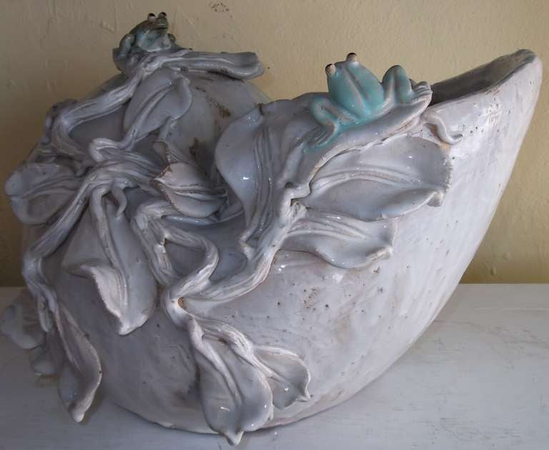 Ceramic Planter could be even a center piece on a table 
Off white color with two colorful frogs.