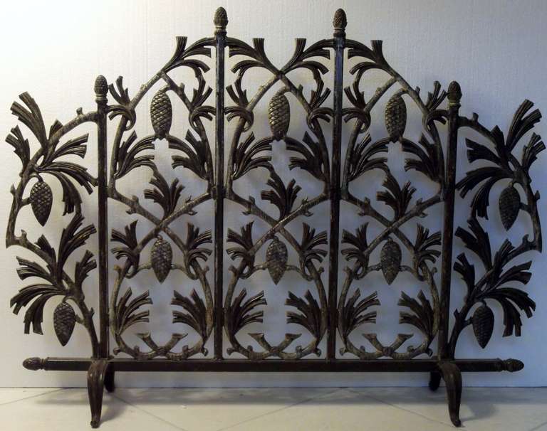 Fireplace screen with pine cone motif, great patina .