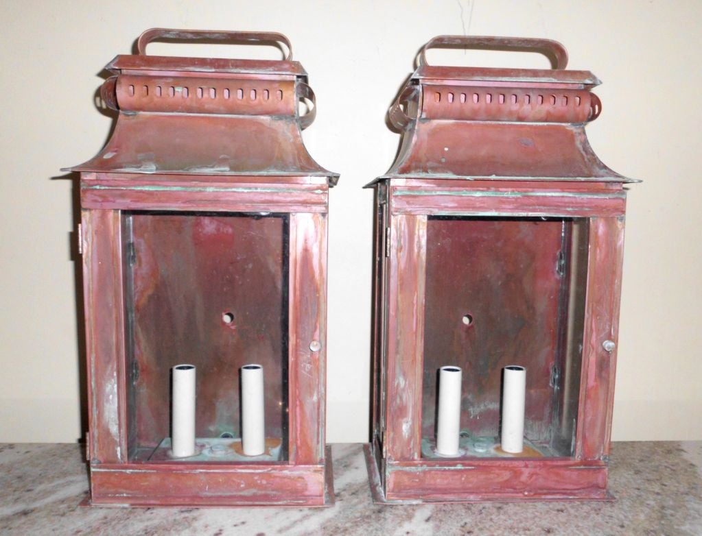 Beautifull and weathered pair of copper wall lanterns ,wired and ready to go.
Two 60 watt lights .