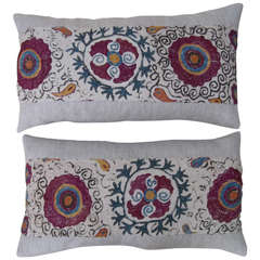 Pair of antique Suzani pillows