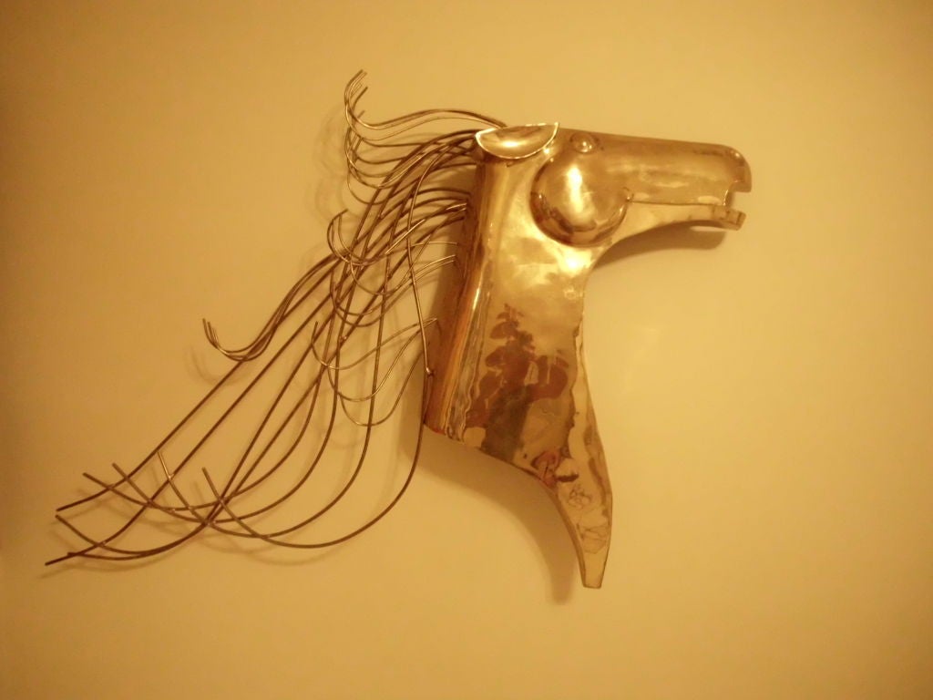 Beautiful brass horse head sculpture ,wall mounted .
Sign :  Curtis jere.