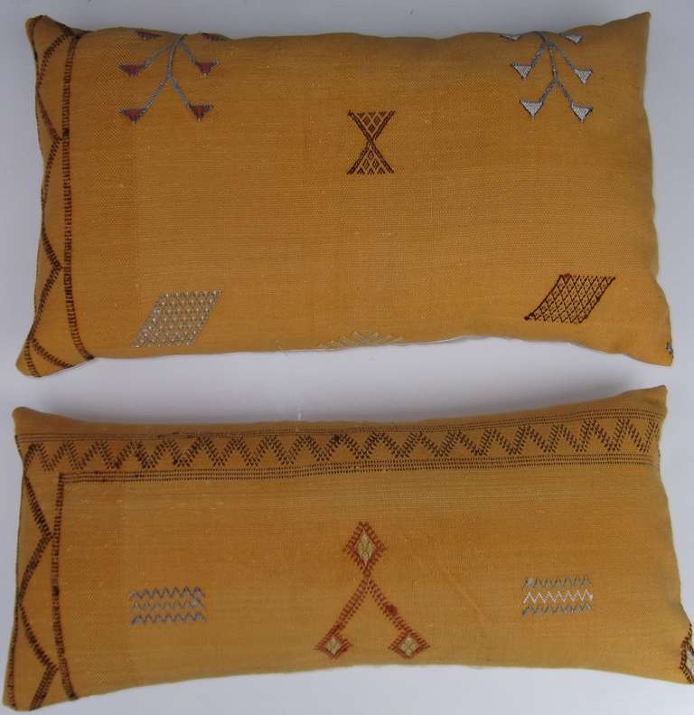 Pair of beautiful pillows made of hand woven rug fragment ,with geometric 
Motifs.
Silk backing .
New inserts.
Size 
1. 25