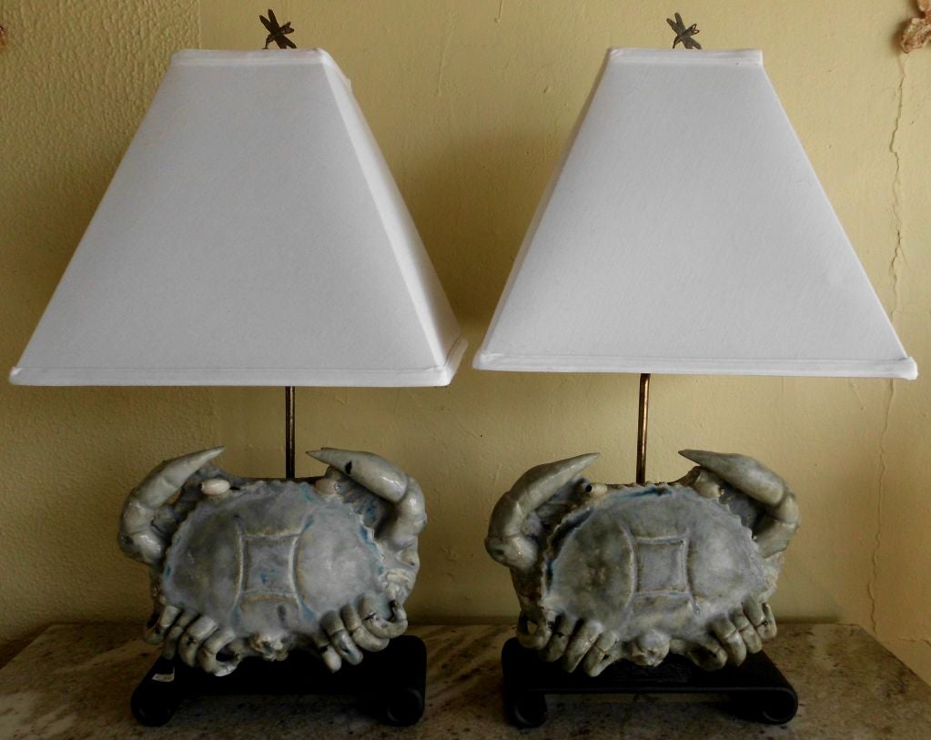 Pair of ceramic crab lamps ,in light cream and light blue on a wood base.
Shades are not included .