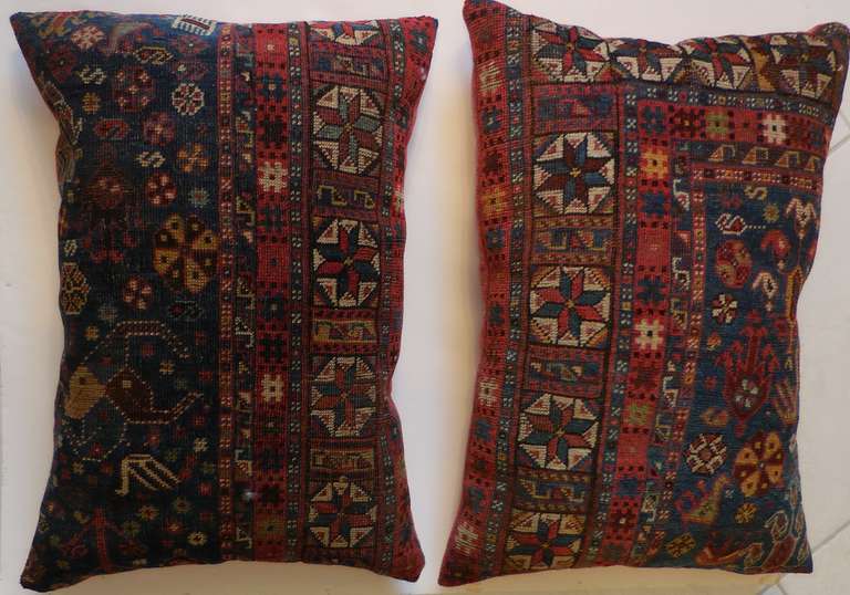 Pair of beautiful pillows ,made of hand woven antique rug fragment ,unusual motif design ,with great muted colors.
To all of you rug antusiastic this pair will be nice addition to your house .
The backing made of cotton.

28