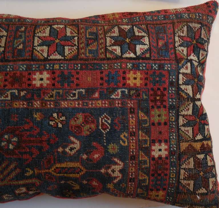Pair of Antique Rug Fragment Pillows 1
