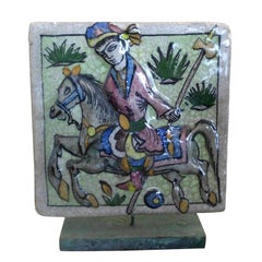 old persian tile of a polo player