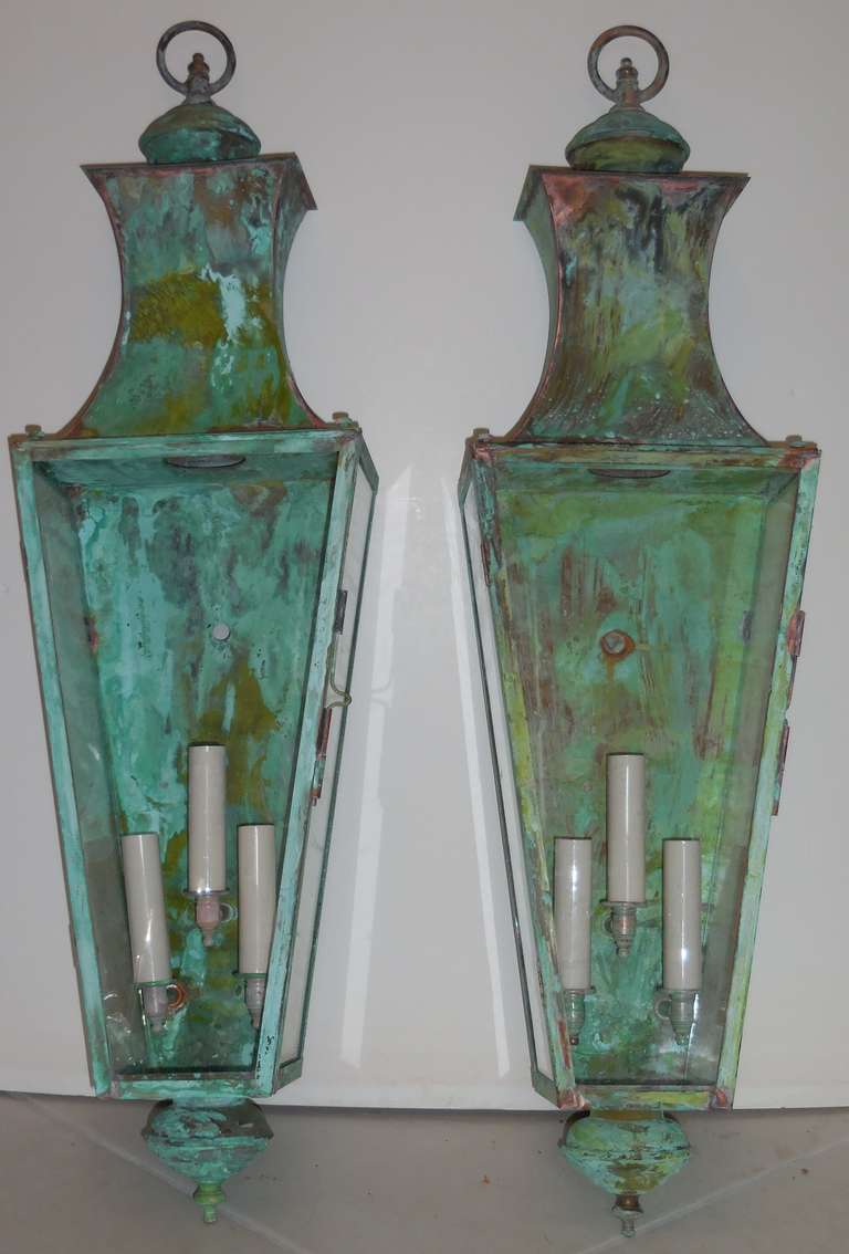 Beautiful pair of copper lantern, weathered with very nice patina great look.<br />
with three 60 watt lights <br />
Ul approved suitable for wet location.<br />
wired and ready to hang.
