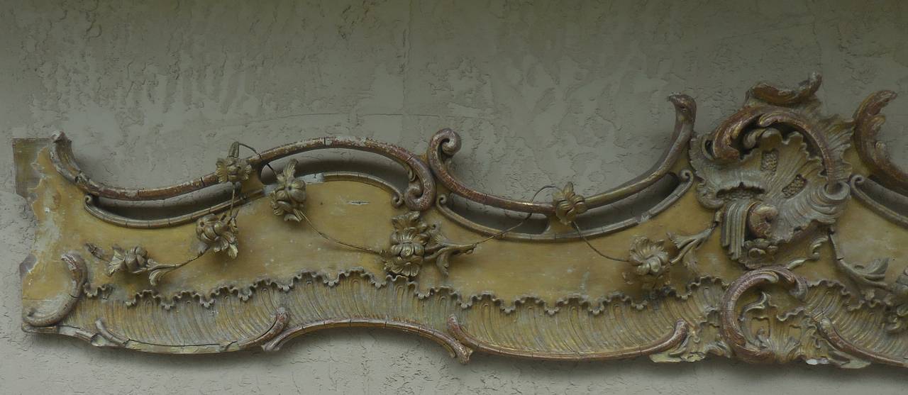 Beautiful horizontal French wall hanging made of carved wood, you can see it was fully gold leaf and some of the flowers are missing.
This antique work of art was partially restored as Mach as we could and is suitable to hang on the wall, so you