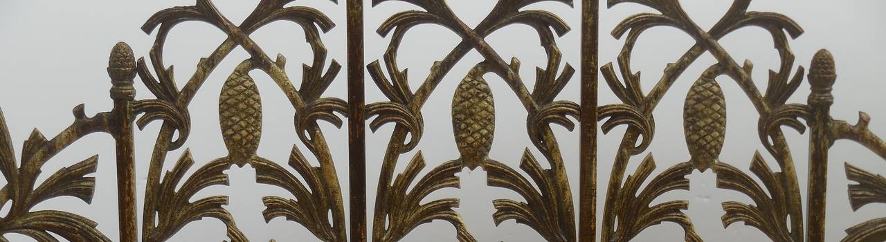 Beautiful fireplace screen made of cast iron with vines and pinecone motif
all around decorative legs. 
Great looking overall patina.