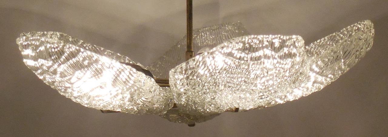Beautiful five-branch chandelier made of clear texture glass with brass hardware.
Ready to hang and light.