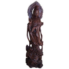 Wood carving of Buddha