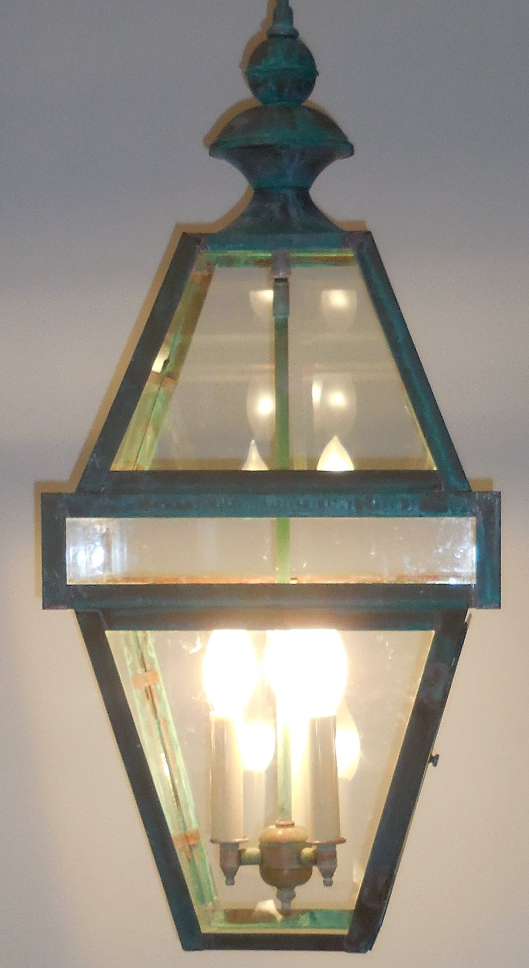 Beautiful weathered hanging lantern made of copper, with four 60 /watt lights.
Electrified and ready to light.
Made in the US and UL approved.
Could be used in wet location, or indoor.