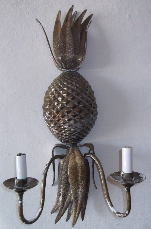 Pair of brass wall sconces weird with two lights of 60/watt each great 
Decorative pair.