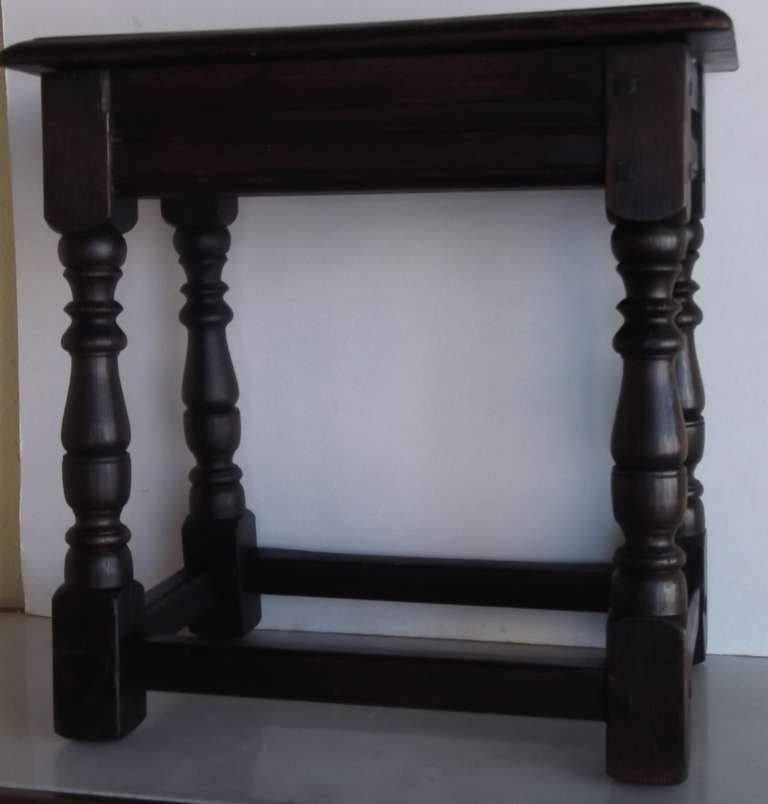Pegged wooden bench, probably dark oak. Beautifully waxed finish.