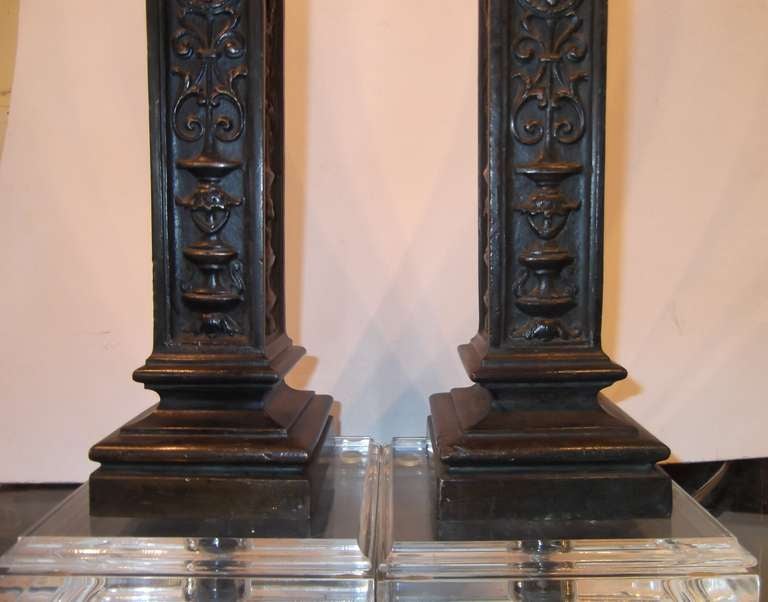 A pair of beautiful table lamps. Made out of bronze with lucite base. Unique details within bronze. 

Actual lucite base is 6