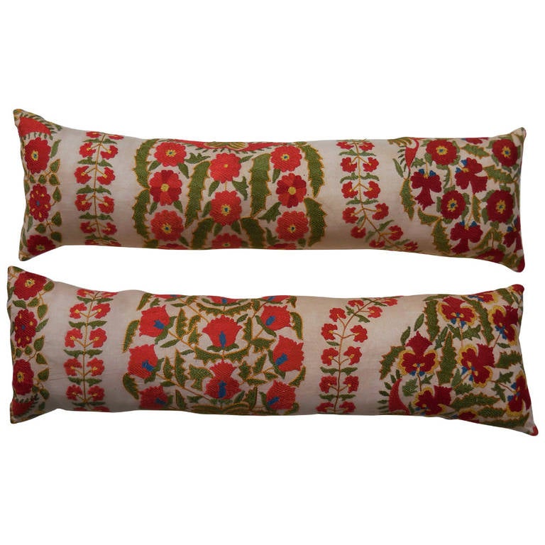 Pair of Suzani long pillows at 1stdibs