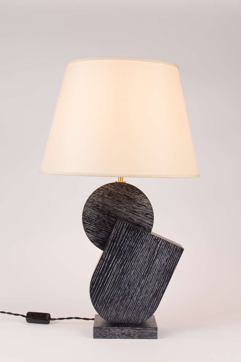 Elegant lamp by Kimille Taylor in ebonized oak.

The wood base is 15 inches
and height to the bottom of  the harp attachment below the socket is 17