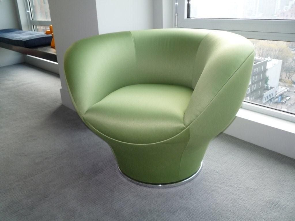 A pair of Igloo Chairs designed by Ola Rune and Cappellini now out of production. <br />
Swivel chairs with Chrome Steel Base. The external body is Polyurethane, the internal cushion is a polyurethane foam.<br />
Custom COM fabric 100 silk<br