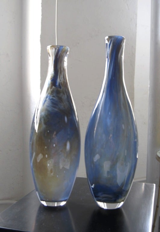 A hand blown Glass bottle by French artist Pascale Riberolles with beautiful shades of blue and amber