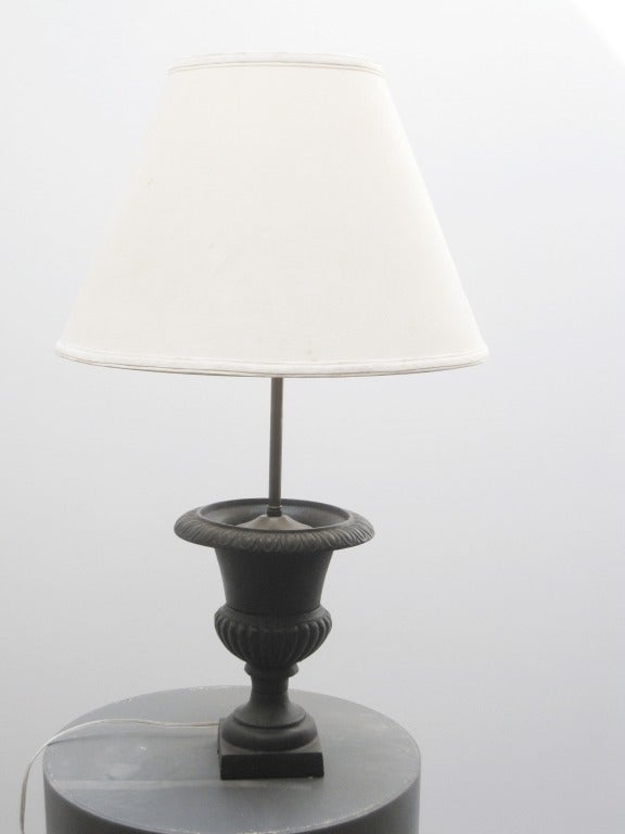 A Classic Cast iron urn mounted as a lamp