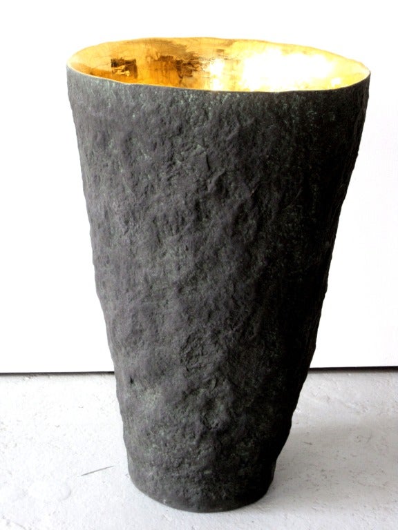 Tall Vessel by Cristina Salusti made with White stoneware Pressed with stone fragments then shaped and tinted with Glaze and Oxyde.

22 Carat gold glazed interior.

Led Free.

Signed and dated