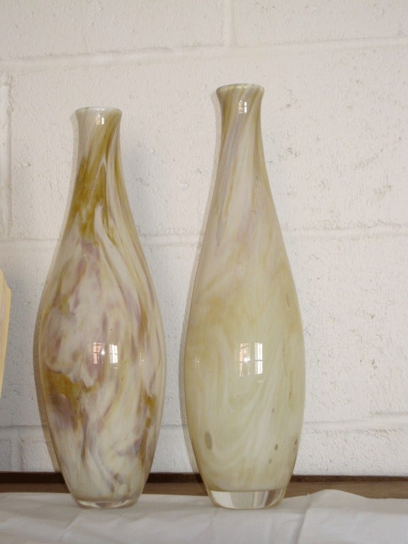 Two hand blown glass vases/bottles by Pascale Riberolles