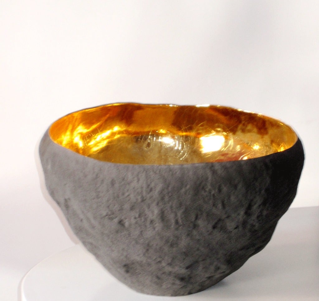 Large round Vessel by Cristina Salusti made with White stoneware Pressed with stone fragments then shaped and tinted with Glaze and Oxyde.

22 Carat gold glazed interior.

Led Free.

Signed and dated