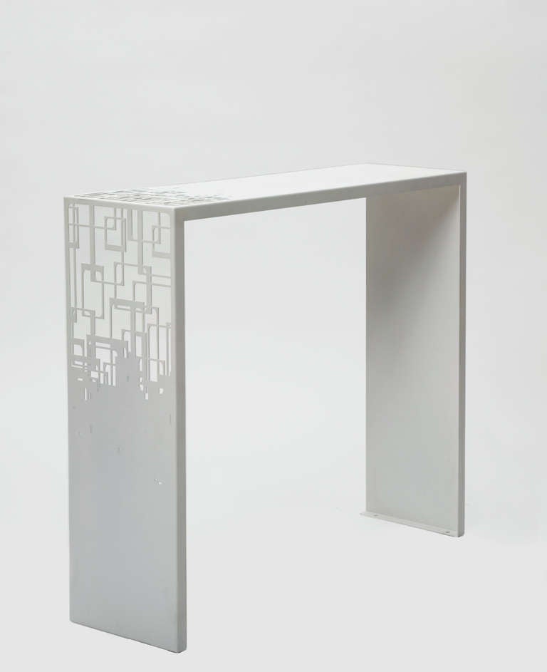 A Modernist /Cubist Console Table hand made in France in Laser Cut Steel. Beautiful and durable white epoxy paint finish.
A slightly larger console table in Black is also available