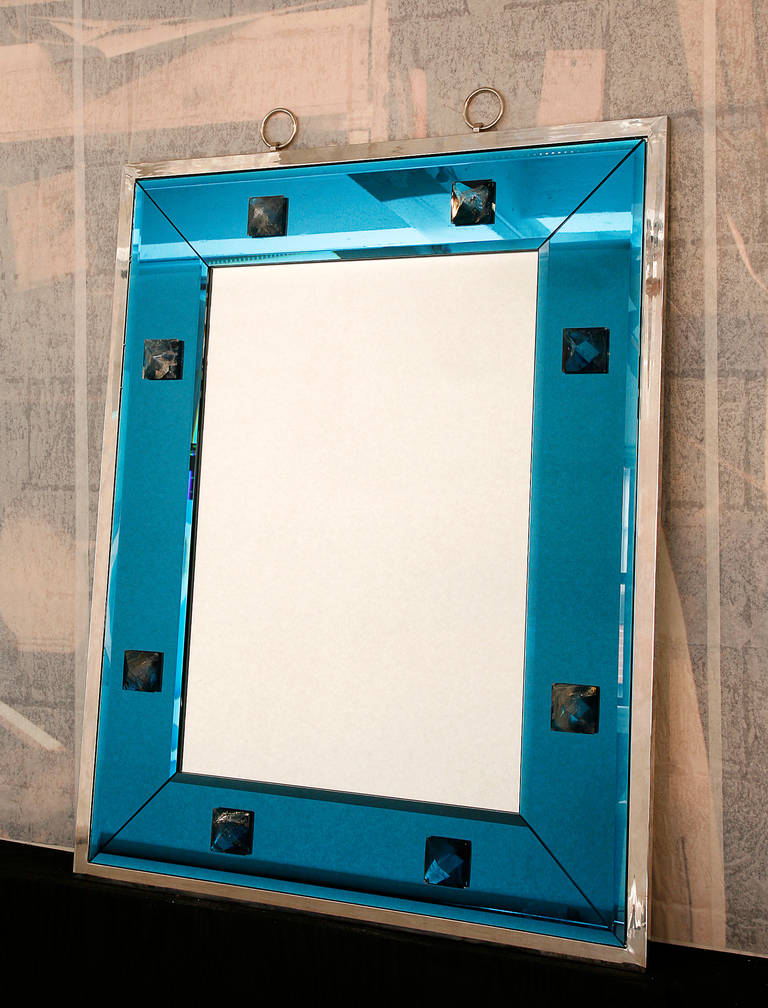 Great mirror with blue frame glass decorated with rock crystal studs.
Exterior frame in nickeled brass

Custom size is possible.