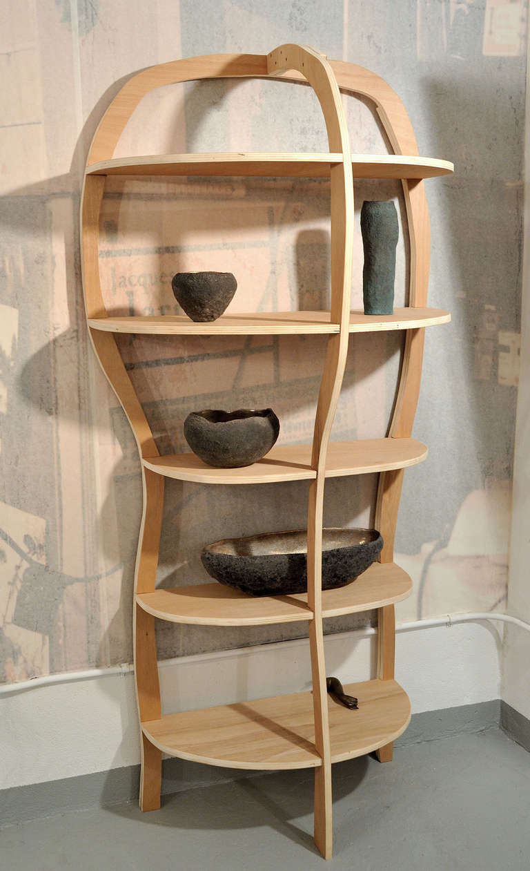Unique biomorphic sculptural bookcase or shelves unit in Plywood.
Hand-sculpted and signed Jacques Jarrige

Jacques Jarrige is represented in the U.S. by Valerie Goodman Gallery.

Latest press on Jacques Jarrige includes IDEAT November 2011, AD