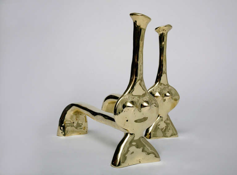 French Pair of Andirons in polished bronze by Jacques Jarrige For Sale