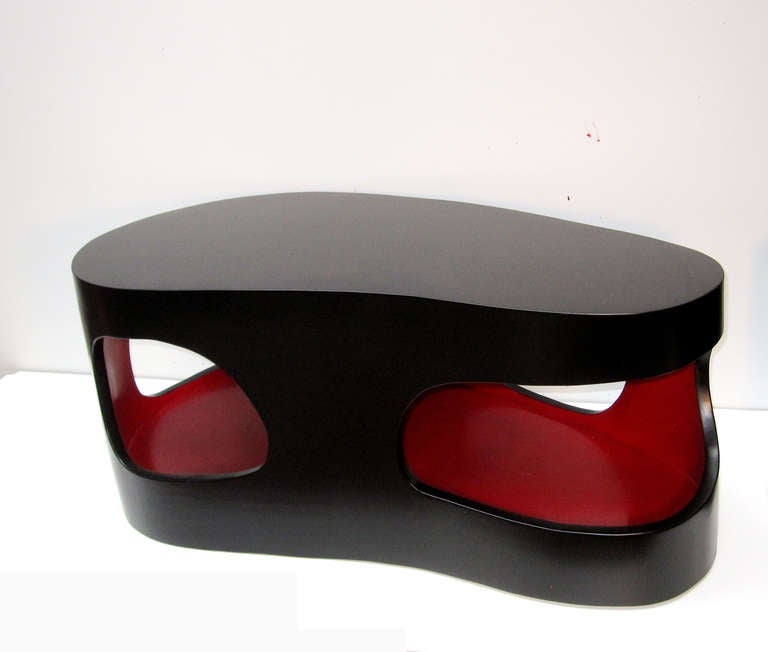 This Cocktail table in lacquered wood by Jacques Jarrige is an artful play on positive and negative space. The inside can house magazines.

3 sizes are available. Also available in white and red

A list of notable solo exhibitions