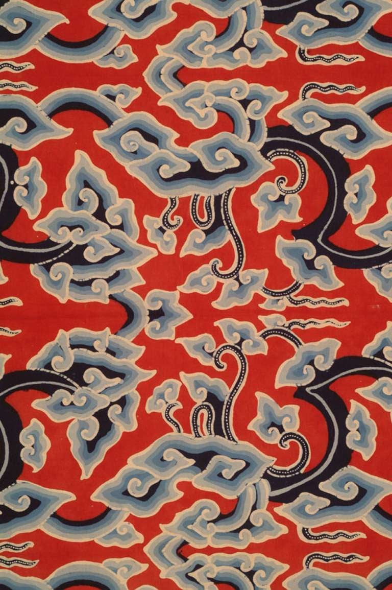 A Batik sarong made of very finely woven cotton.The island of Cirebon has a large indigenous Chinese population and its batiks feature Chinese cloud designs. This example has eight colors and is meticulously executed.
