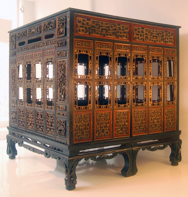 A canopied, carved bed made in the Straits Chinese style. Settling along the major trade route that opened up between China and the Indian ocean in the 18th century, the so-called Straits Chinese brought much of their Chinese culture with them, yet