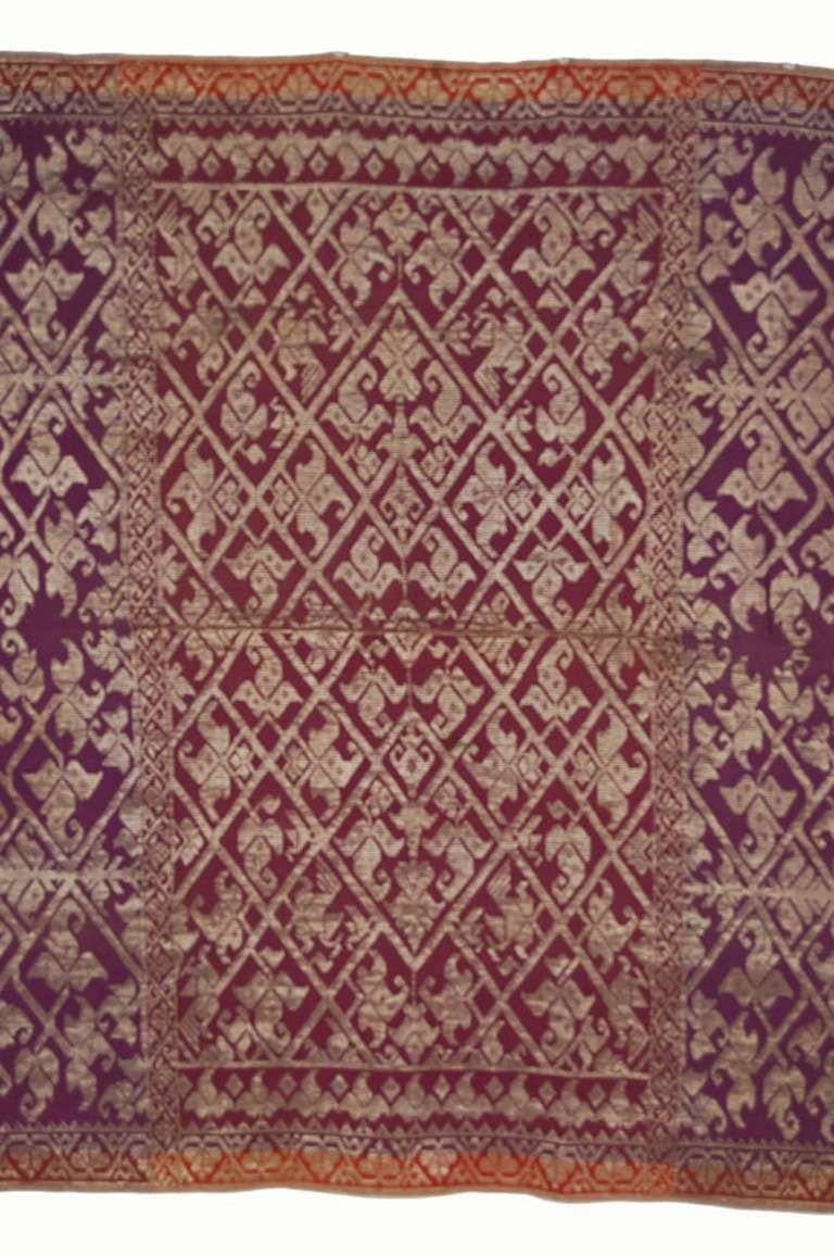 The songket is a form of brocade weaving with metallic thread. It is woven in the islands of Indonesia most affected by Malay and Bugis Islamic immigration. The island of Sumbawa, east of Lombok, has an Islamic mercantile history and its Kre Alang
