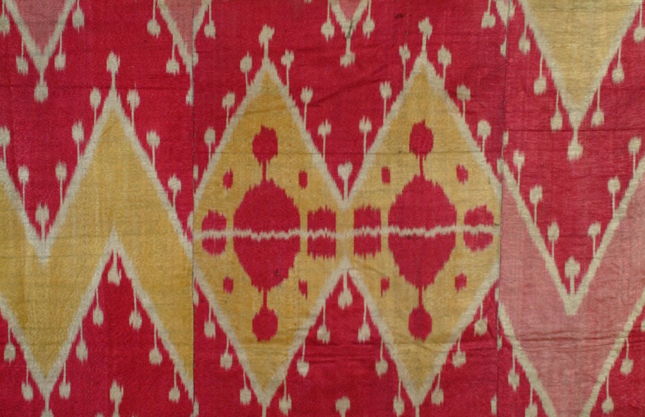 Uzbek Ikat of zigzag motif in four colors. The bold geometrical design is nicely complemented by a whimsical splicing of the panels.