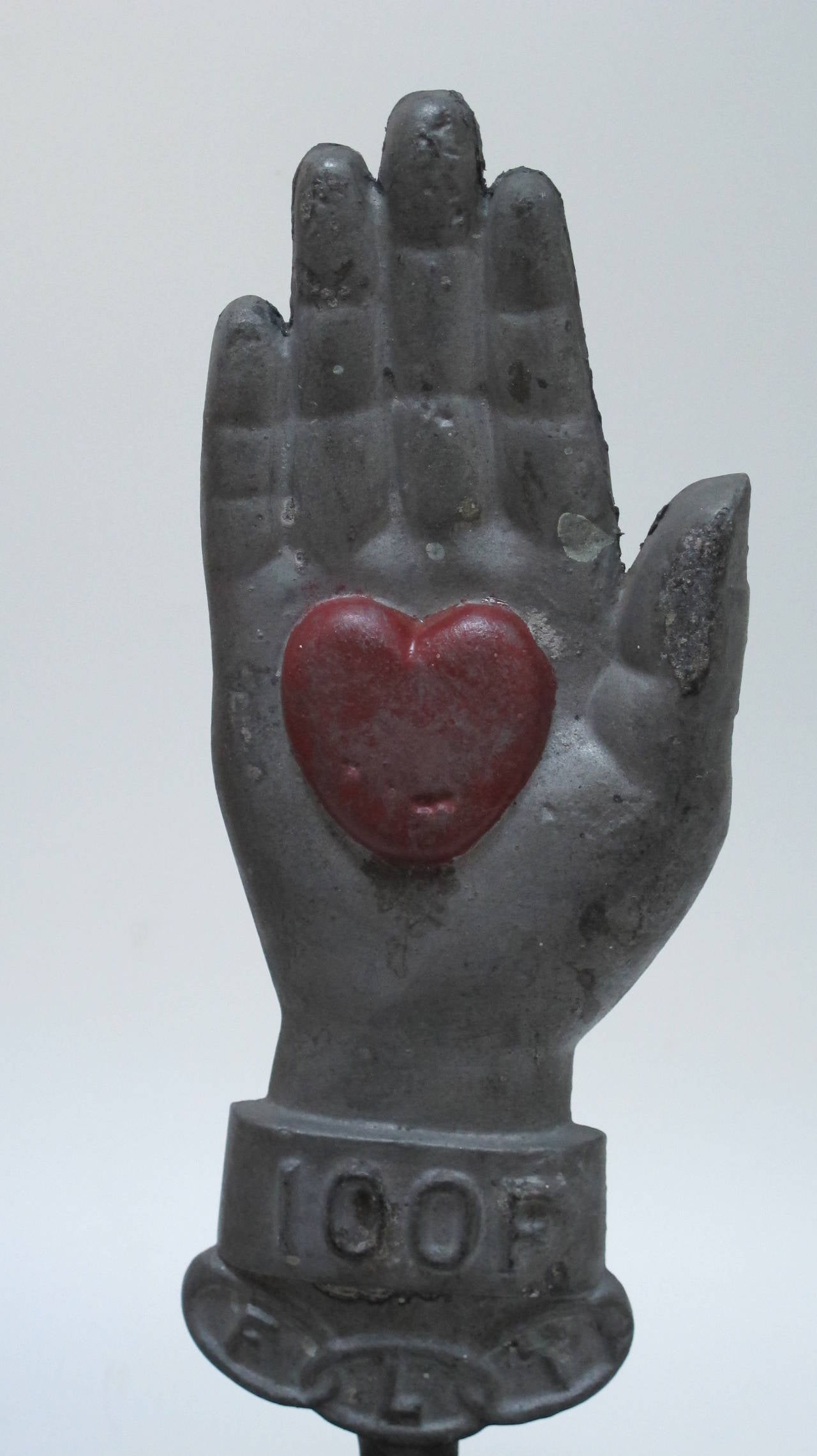 Painted Iron Heart in Hand Sculpture 1