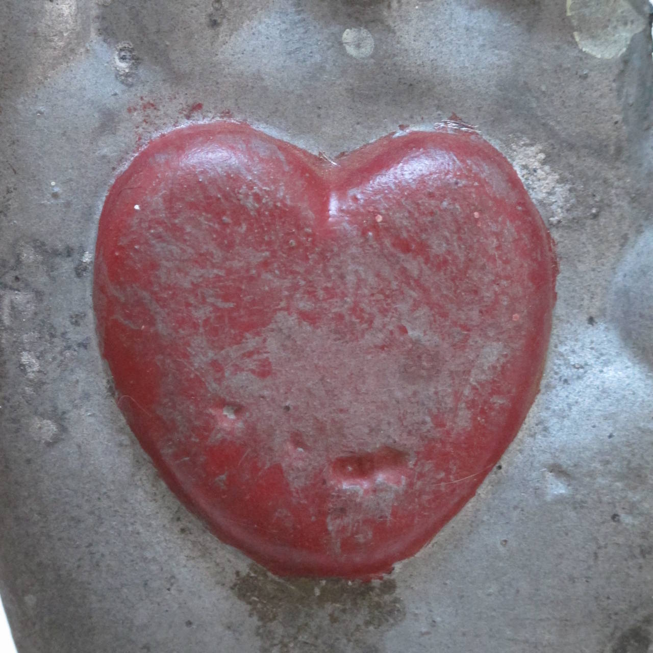 American Painted Iron Heart in Hand Sculpture
