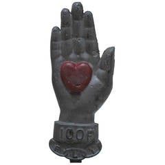 Used Painted Iron Heart in Hand Sculpture